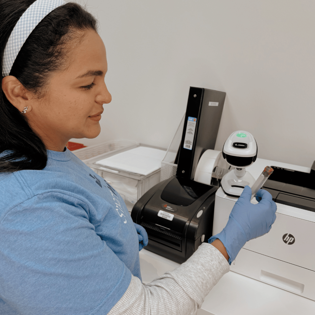 SmartMED Provider Analyzing Blood Sample for SmartLABS Patient