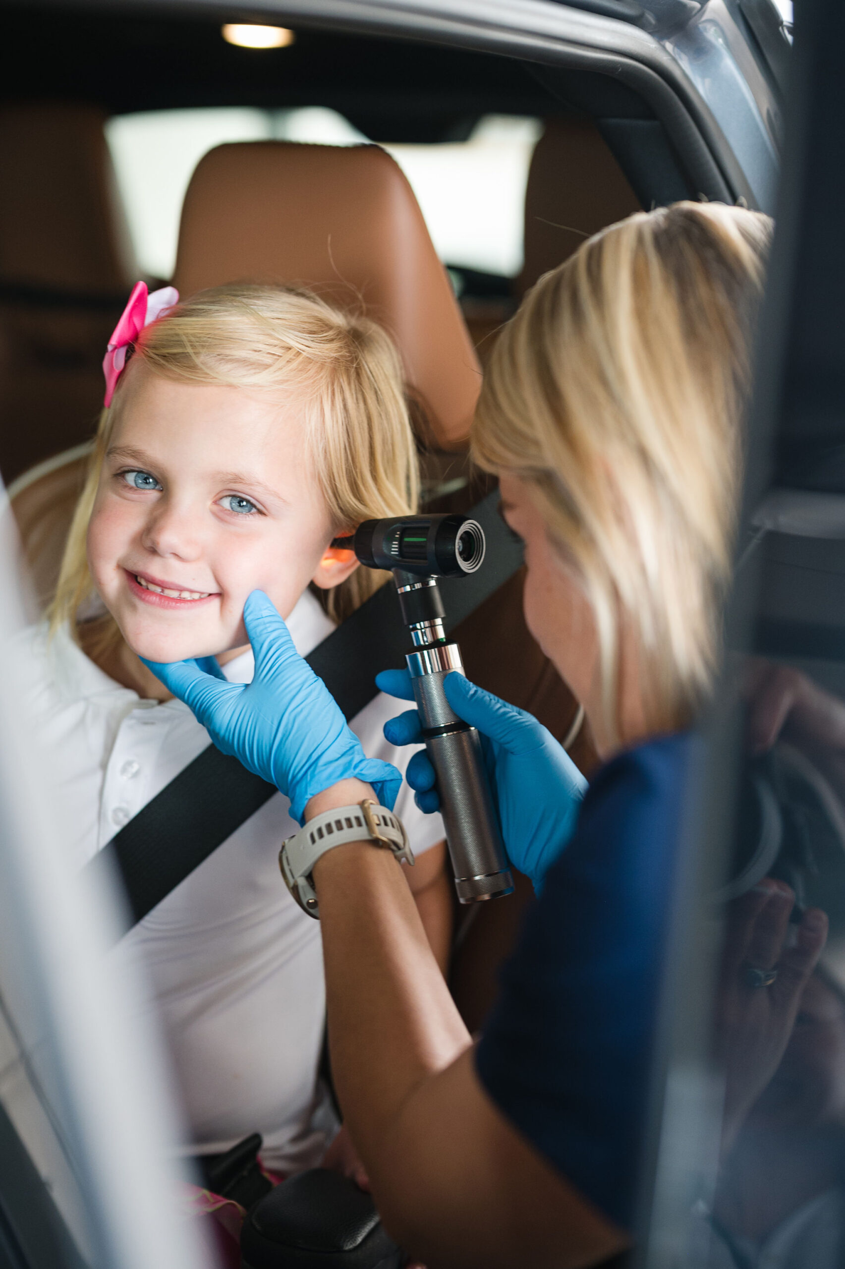 Kid In Drive-Thru Urgent Care Being Seen By a SmartMED Provider