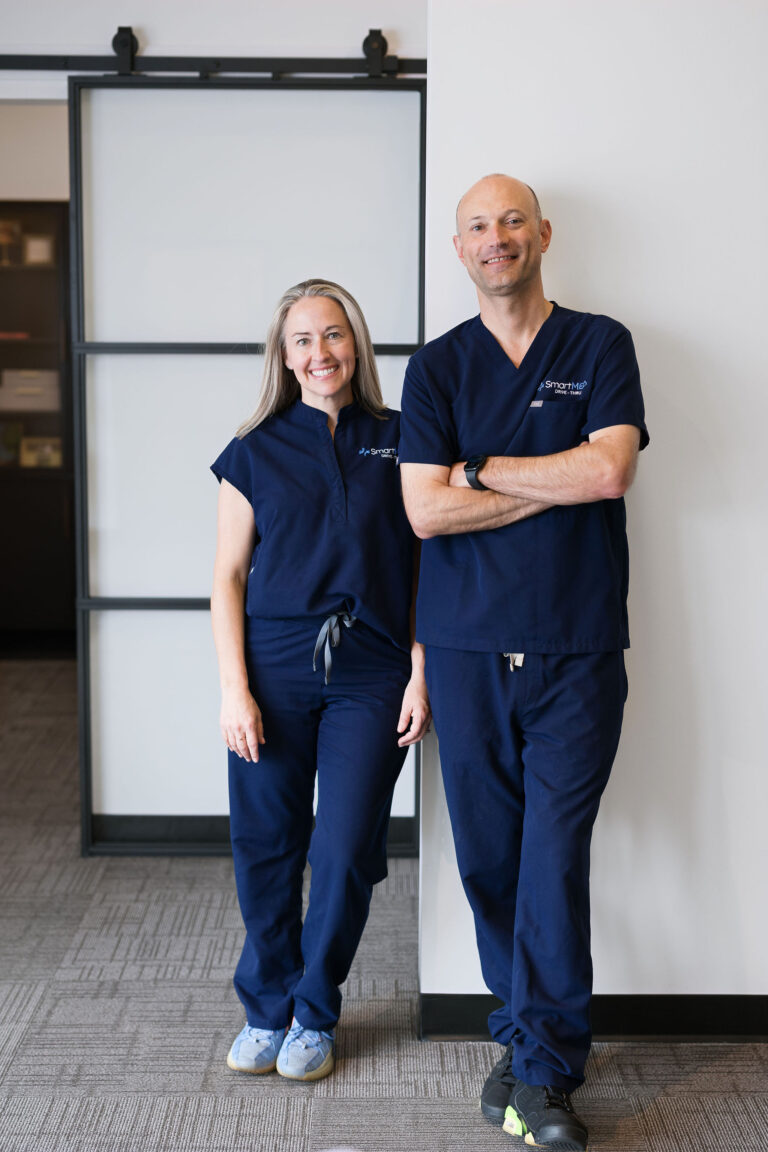 Stacy and Luke Lathrop Standing Inside the SmartMED Drive-Thru Roswell, GA Location